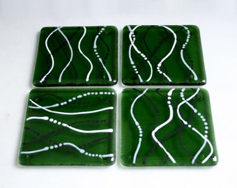 Fused glass coasters. 'Serpentine - Ashes'  Black, white & grey on a bottle green base. Squiggly coasters. Choose 2 or 4. Can be customized