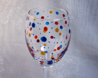 Polka Dot - Multi - An exclusive design, hand painted, wine glass featuring multi coloured polka dots encircling the bowl.