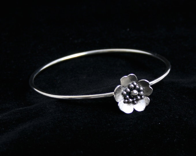 Floating rose bangle 'Wild Rose' Traditionally hand made. Satin finish roses. Fully UK Hallmarked Sterling Silver. Medium  67mm diameter.