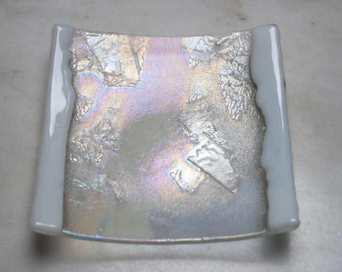 Frozen River - Square. A hand made fused glass decorative plate / trinket dish with a textured shimmering iridescent finish on a clear base.