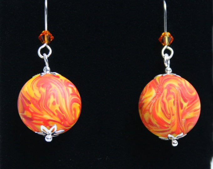 Handmade 'Lava' earrings. Lampworked glass, Swarovski crystal and sterling silver. Fish hook earwires for pierced ears. Red/Yellow/Orange.