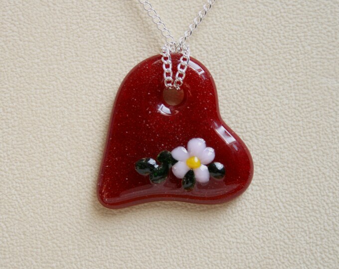 Fused glass 'Flora' pendant. Palest pink flower on a transparent red heart glass pendant. (choose sterling silver or silver plated chain)