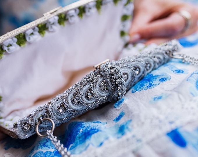 Antique  micro beaded purse frame remade in silver beaded lace over white silk.