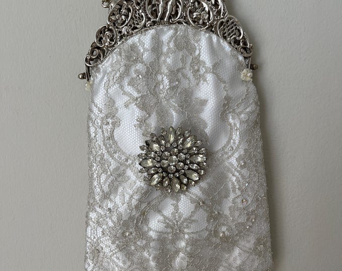 Antique  silver   frame remade in vintage beaded lace over white silk.