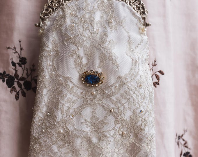 Antique  silver   frame remade in vintage beaded lace over white silk.