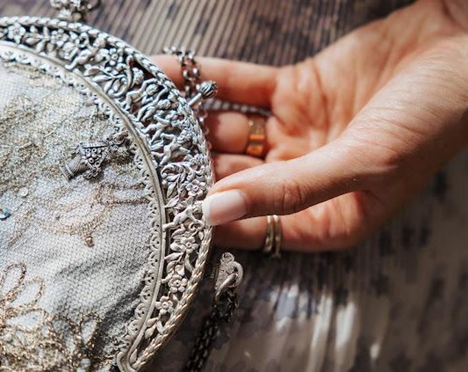 Antique  silver  hallmarked purse frame remade in vintage beaded lace over Silver silk.