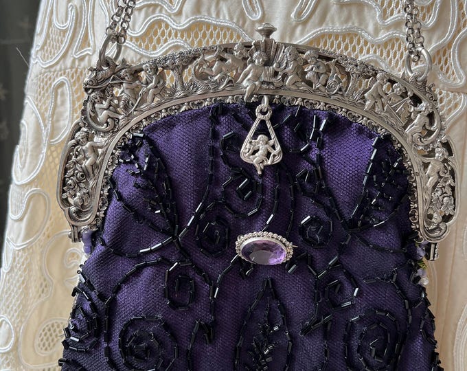 Antique  silver hall  marked purse frame remade in vintage beaded lace over purple silk.