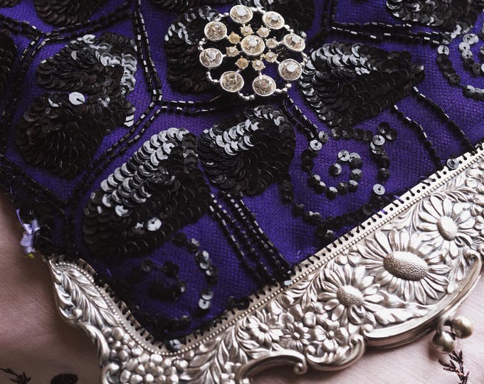 Antique  silver  marked Alpaca purse frame remade in vintage beaded lace over purple silk.
