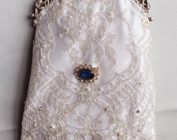 Antique  silver   frame remade in vintage beaded lace over white silk.