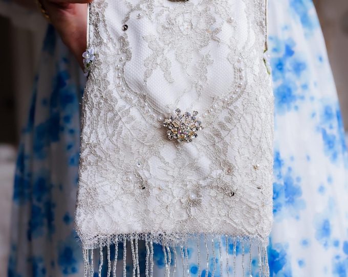 Antique  micro beaded purse frame remade in silver beaded lace over white silk.
