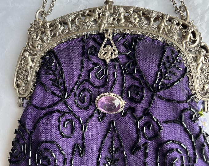 Antique  silver hall  marked purse frame remade in vintage beaded lace over purple silk.