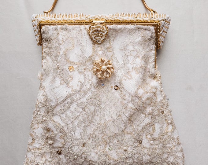 Antique  micro beaded purse frame remade in vintage beaded lace over white silk.