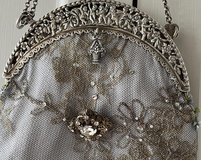 Antique  silver  hallmarked purse frame remade in vintage beaded lace over Silver silk.
