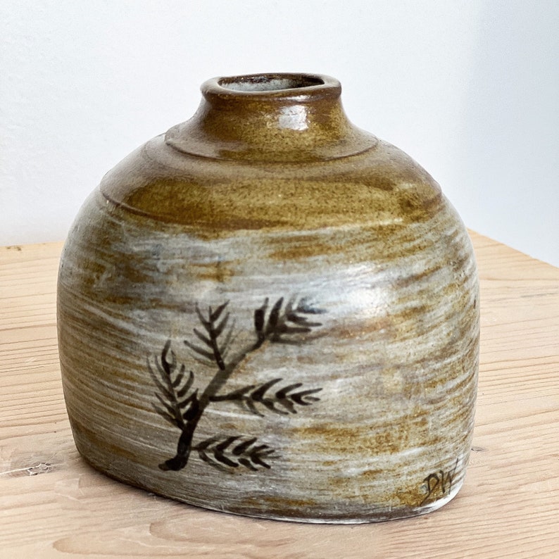 Hand made vase in chocolate stoneware, in an oval shape, and decorated in white slip with a wheat motif in black ink. image 1