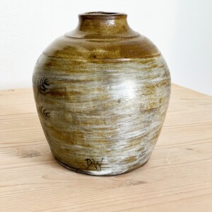 Hand made vase in chocolate stoneware, in an oval shape, and decorated in white slip with a wheat motif in black ink. image 4