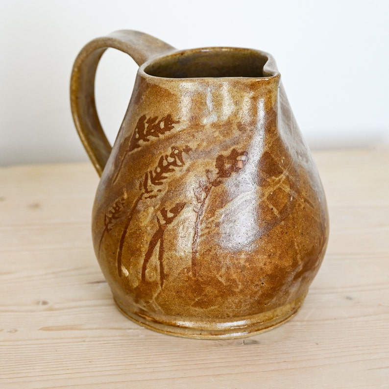 Ceramic pitcher, hand-thrown in stoneware, golden brown with hand-painted wheat motif on two sides. image 3