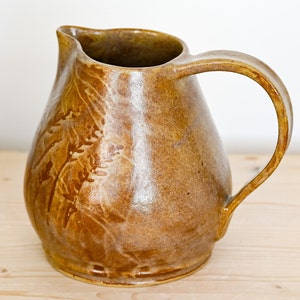 Ceramic pitcher, hand-thrown in stoneware, golden brown with hand-painted wheat motif on two sides. image 4