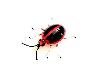 The Tiny Shiny Beetle, Up-cycled Insect by Julie Alice Chappell