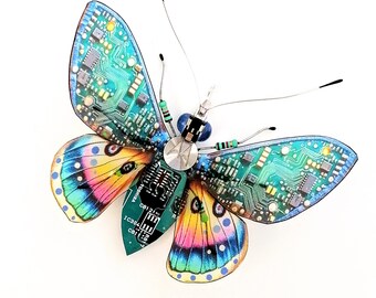 The Little Blue Motorolla Butterfly, Fantasy Circuit Board Insect by Julie Alice Chappell.