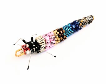 The Pink Phone Button Caddisfly Larve, fantasy Insect by Julie Alice Chappell