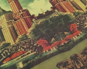 New York Vintage printed fabric panel on perforated fabric