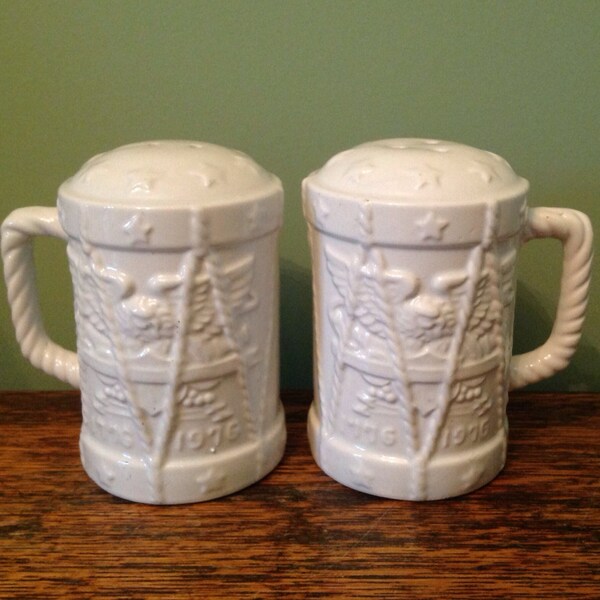 Salt and Pepper Shakers in white with Eagle, Stars and Rope. Bicentennial.