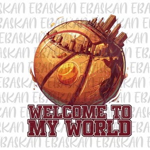 以下が含まれることがあります： 街並みが描かれたバスケットボール。バスケットボールはオレンジと茶色で、黒い線が引かれている。街並みは、灰色と茶色の高い建物で構成されている。バスケットボールの下には、赤い文字で「Welcome to My World」と書かれている。