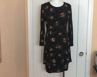 Fancy Liz Claiborne Black Dress, Long Sleeved with Jacket appearance. Natural waist, Zipper back & Fab knotted buttons in front. Size 12P.