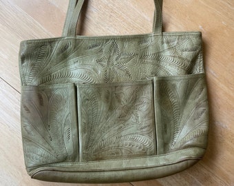 Tooled Leather Tote Bag. Beautiful sage green shoulder bag has 3 front pockets & full zippered top closure. Made by JL Salivar, in Paraguay.