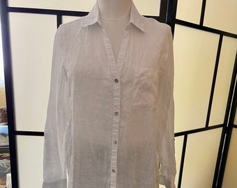 White Linen Woman's Shirt by Sigrid Olsen. Extra long, man tailored, button front Top has a V-neck and long sleeves. Boho Spring fashion.