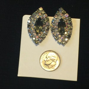 Vintage Kramer Clip Earrings. Pave set AB crystals with grey-green marquise cut center stone. Sparkly, unusual earrings. 1-3/8" l. Gift Box.