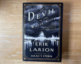 First Edition, The Devil in the White City. Historical thriller about building the 1893 Chicago World's Fair & biography of a serial killer.