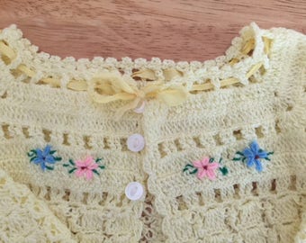 INFANT SWEATER, 3 - 6 mos, pale yellow hand-knit or crotched, embroidered flowers across front, Unisex and a deal of a price.