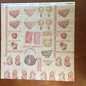 Tea Ceremony craft paper scrapbook paper. 23 sheets. 12" x 12" square. shades of tan, rose, brown. All equipment pictured.