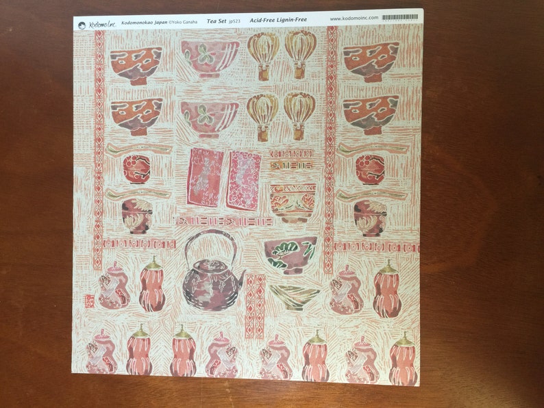 Tea Ceremony craft paper scrapbook paper. 23 sheets. 12" x 12" square. shades of tan, rose, brown. All equipment pictured.