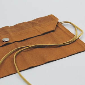 The Max Utility Roll // Caramel Brown Pocketed Accessory Roll with Tie Closure