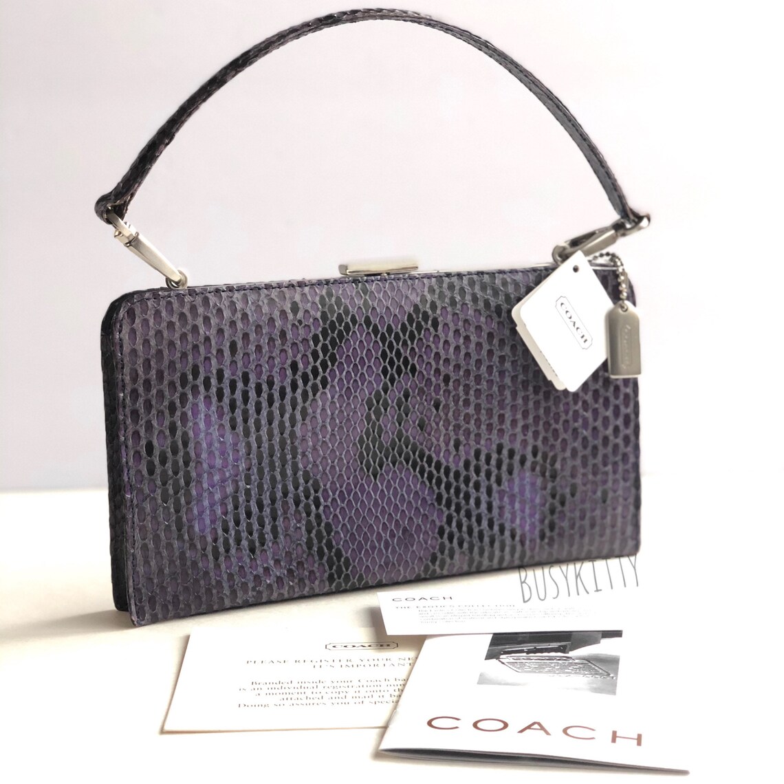 coach purple snakeskin purse