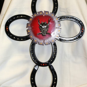 Handmade Metal Horseshoe Cross with Saw Blade Center and Devil Face Emblem