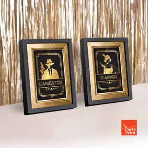May include: Two framed art prints with a gold and black art deco design. One print says "Gangsters" and features a silhouette of a man in a fedora holding a gun. The other print says "Flappers" and features a woman with a cigarette holder.