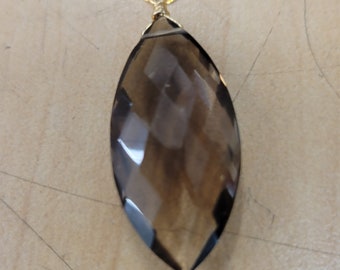 A Quality Smoky Quartz Faceted Marquee  14mm x  25mm