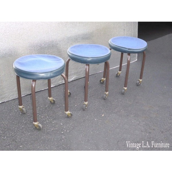 Three Vintage Mid Century Modern Industrial Blue Stools on Castors