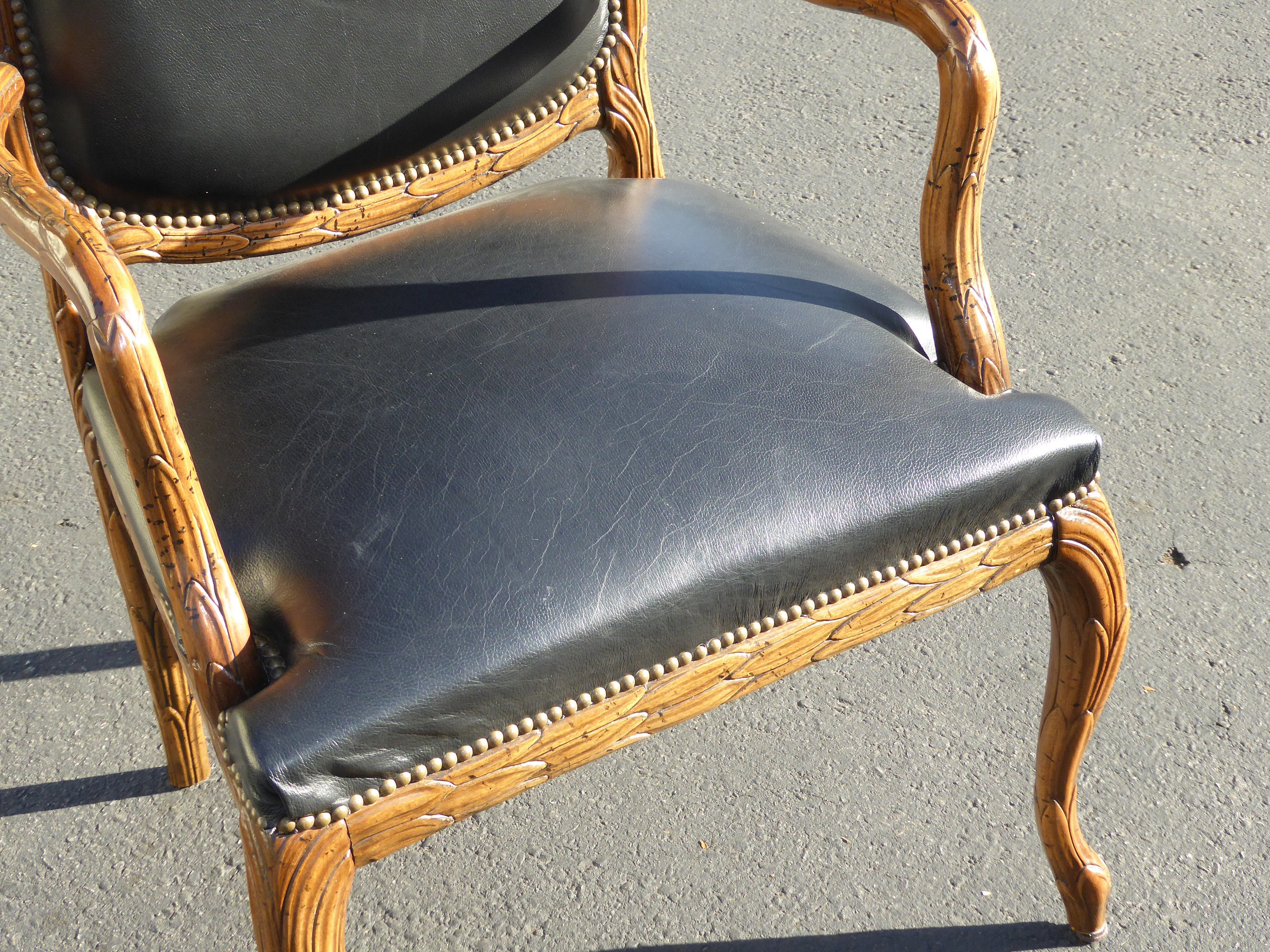 French Provincial Leather Ornately Carved Wood Black Leather Arm Chair