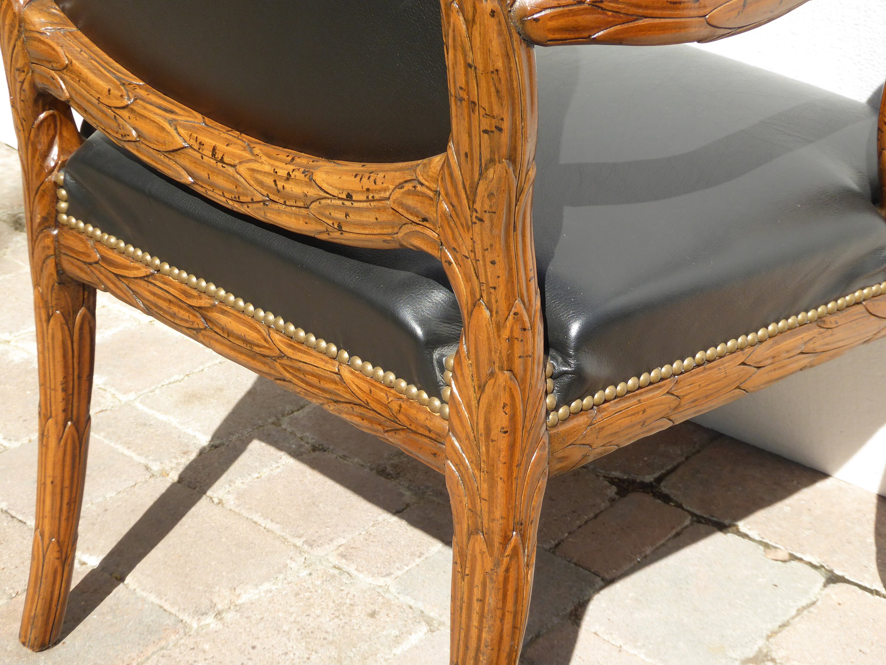 French Provincial Leather Ornately Carved Wood Black Leather Arm Chair