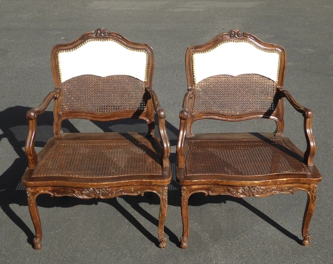 Pair of Vintage French Provincial Carved Wood Cane Arm Chairs