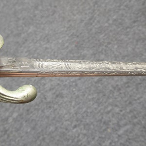 Vintage Engraved Sword with Cover image 9