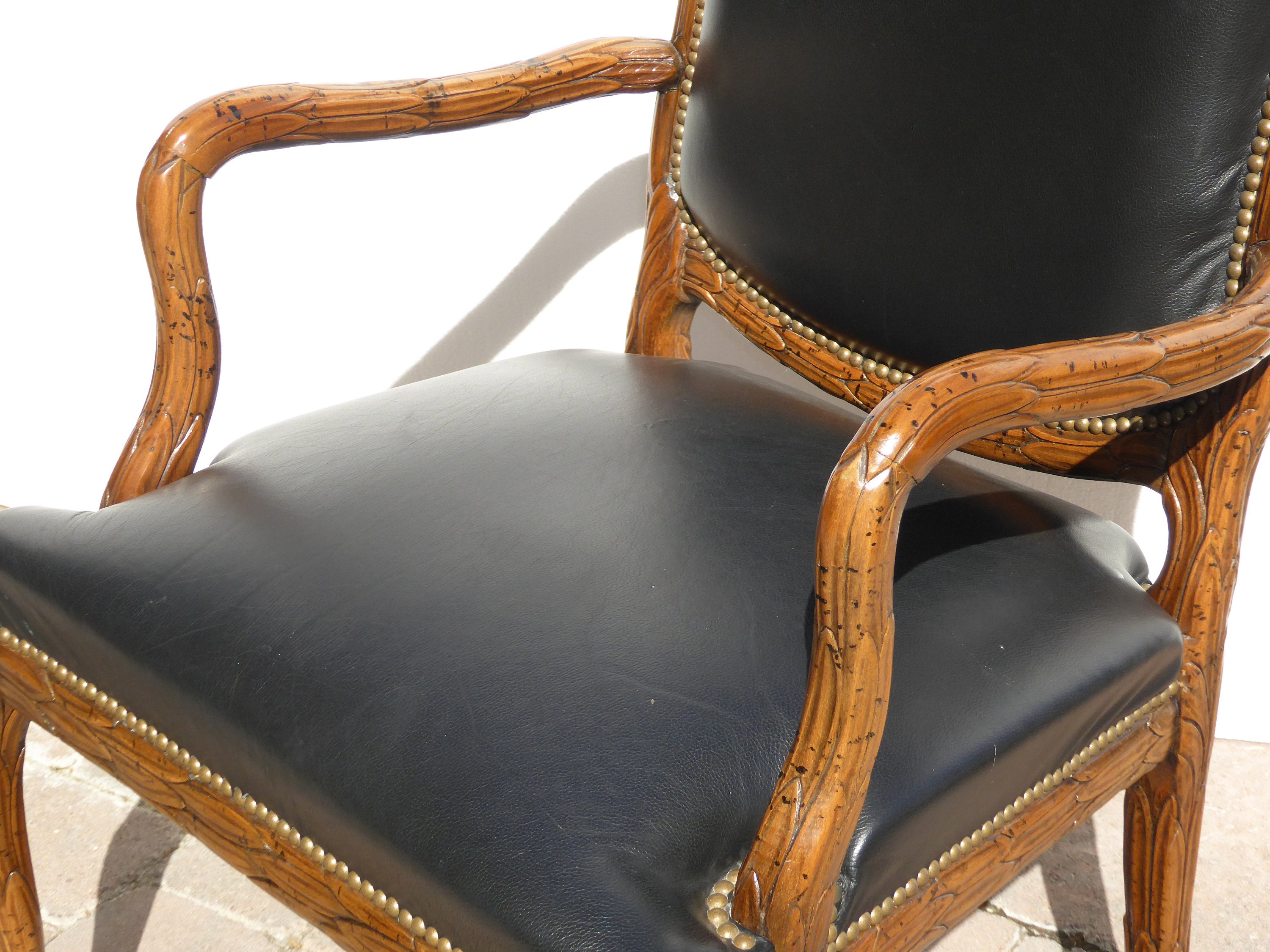 French Provincial Leather Ornately Carved Wood Black Leather Arm Chair