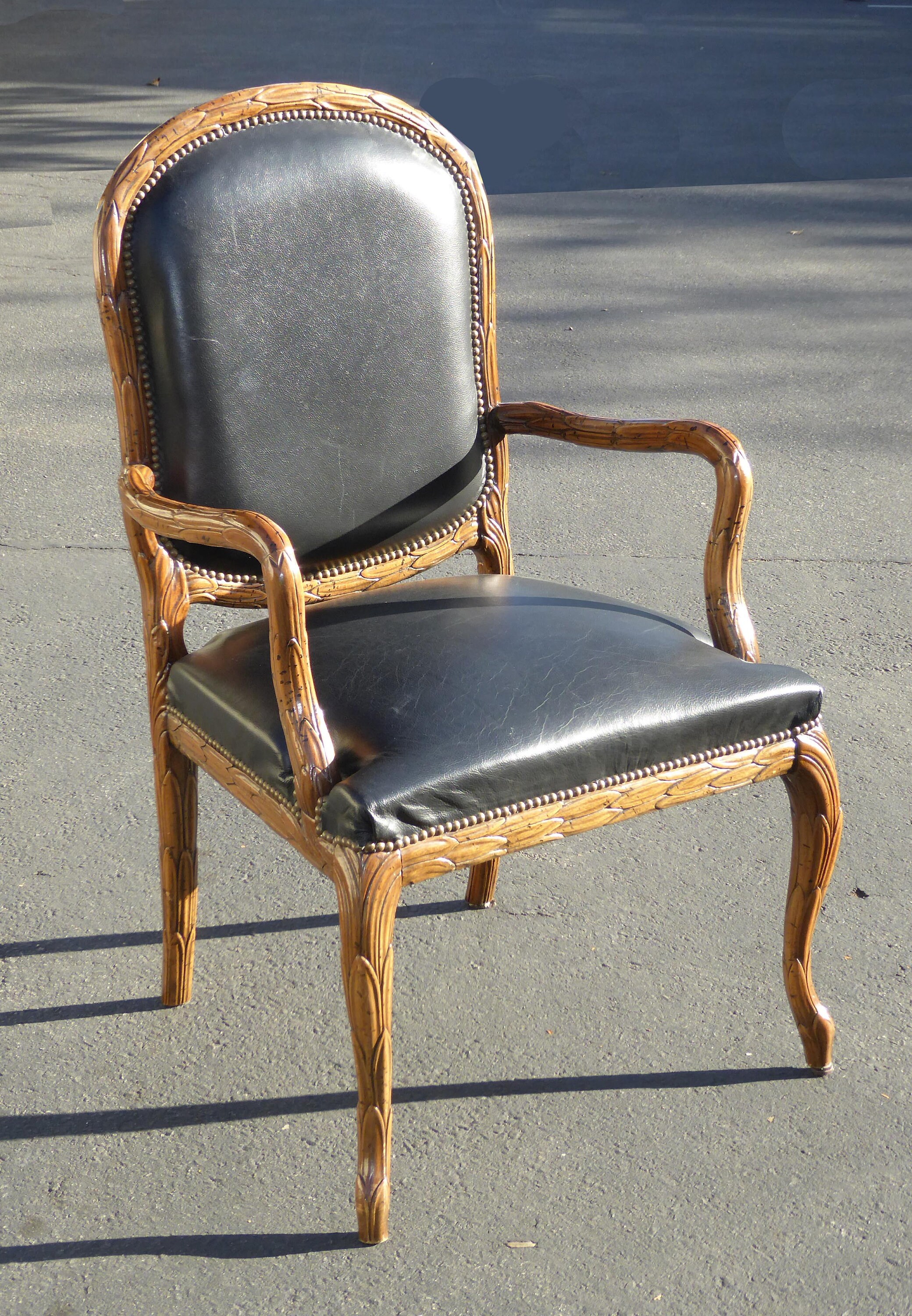 French Provincial Leather Ornately Carved Wood Black Leather Arm Chair