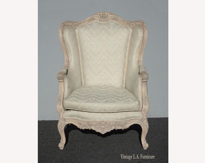 Vintage French Louis XV Wingback with Carved Ornate Figural Frame
