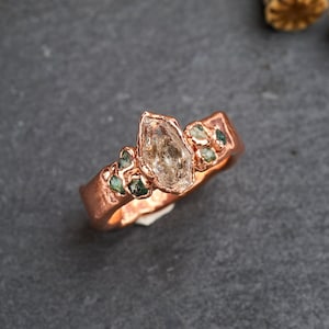 Herkimer diamond ring with emeralds. Rustic alternative engagement ring. Hammered copper wedding band. Raw crystal statement jewelry.
