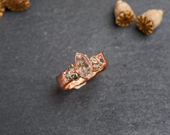 Herkimer diamond ring with emeralds. Rustic alternative engagement ring. Hammered copper wedding band. Raw crystal statement jewelry.